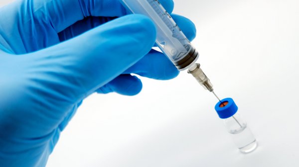 Gloved Hand Holding Syringe Inserted Into Small Credit Stockphotokun